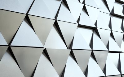 Silver wall facade with geometric shapes triangle elements. Abstract architecture details pattern. Minimal abstract background